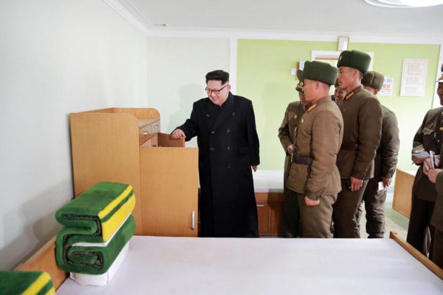 This undated picture released from North Korea's official Korean Central News Agency (KCNA) on November 4, 2016 shows North Korean leader Kim Jong-Un (R) inspecting a special operation battalion under the Korean People's Army (KPA) Unit 525 at an undisclosed location.  REPUBLIC OF KOREA OUT    / AFP PHOTO / KCNA / KCNA