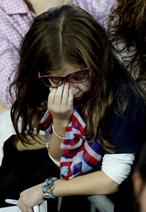 NEW YORK, NY - NOVEMBER 08: A young girl rubs her eyes as she watches voting results come in at Democratic presidential nominee former Secretary of State Hillary Clinton's election night event at the Jacob K. Javits Convention Center November 8, 2016 in New York City. Clinton is running against Republican nominee, Donald J. Trump to be the 45th President of the United States.   Drew Angerer/Getty Images/AFP == FOR NEWSPAPERS, INTERNET, TELCOS & TELEVISION USE ONLY ==