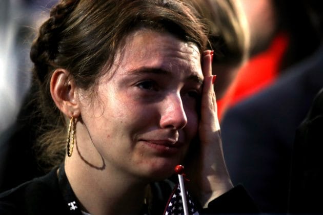 NEW YORK, NY - NOVEMBER 08: A woman reacts as she watches voting results at Democratic presidential nominee former Secretary of State Hillary Clinton's election night event at the Jacob K. Javits Convention Center November 8, 2016 in New York City. Clinton is running against Republican nominee, Donald J. Trump to be the 45th President of the United States.   Win McNamee/Getty Images/AFP == FOR NEWSPAPERS, INTERNET, TELCOS & TELEVISION USE ONLY ==