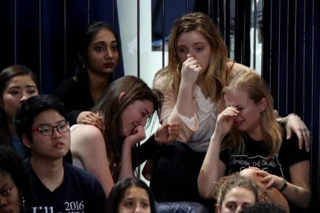 NEW YORK, NY - NOVEMBER 08: A group of women react as voting results come in at Democratic presidential nominee former Secretary of State Hillary Clinton's election night event at the Jacob K. Javits Convention Center November 8, 2016 in New York City. Clinton is running against Republican nominee, Donald J. Trump to be the 45th President of the United States.   Drew Angerer/Getty Images/AFP == FOR NEWSPAPERS, INTERNET, TELCOS & TELEVISION USE ONLY ==